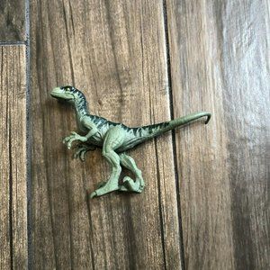 jurassic dinosaur white stamp on foot green velociraptor Striped Back￼